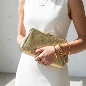 Vintage 1950s metallic gold evening clutch with chain wrist strap